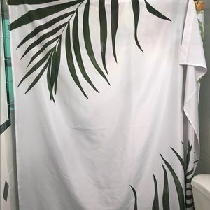 Green and white shower curtain